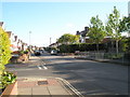 Staggered crossroads at Court Lane with Mansvid Avenue to the left and Hilary Avenue to the right