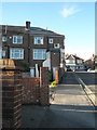 Bus stop at very top of Lower Drayton Lane