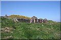 NO8574 : Clifftop Ruins by Anne Burgess