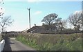 Sharp bend in the road near Penrhos-engan