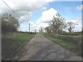 Approaching a minor crossroads by Chapel Farm on the Paradwys-Llanfawr road