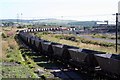 Empty Coal wagons arrive at Onllwyn for loading .