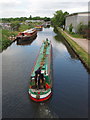 Narrowboat from footbridge to Slough Arm