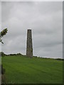 Isolated chimney in a field at Manhay