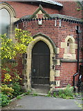 SD8434 : The Parish Church of St Cuthbert, Burnley, Doorway by Alexander P Kapp