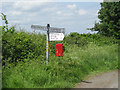 SO4797 : Post box & signpost by Row17