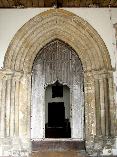 The church of All Saints - C15 door with wicket gate