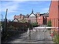 The gates to the former Abbey Gate Independent Primary School after the fire