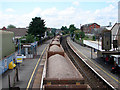 An aggregate train passing through Totton Station