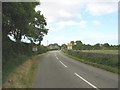 Entering the 30mph zone on the B 4421 at Llanddaniel-Fab