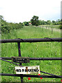 Field gate by churchyard