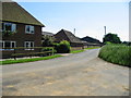 Junction of Duck Street and lane through Standardhill Farm