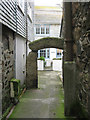 Granite arch entrance to yard