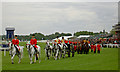 The Royal carriages leave after carrying The Queen to the races