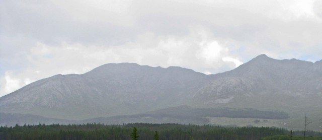 Forested plain and eastern slopes of a portion of The Twelve Bens