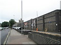 Long, grim wall at HMP Kingston