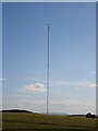 NJ9437 : Communications Mast near Arnage by Derek Gray