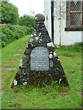 NM4339 : The war memorial in St Ewen's churchyard on Ulva by Dave Napier