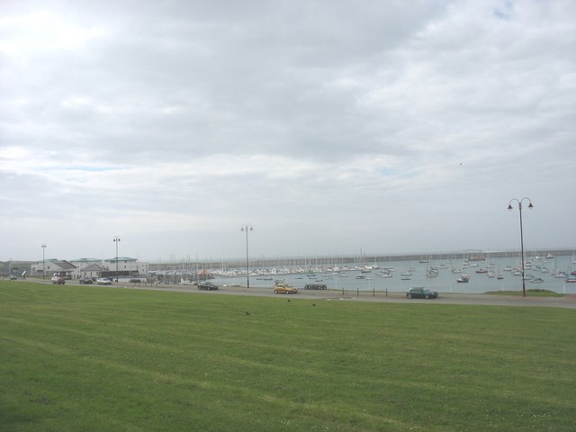 View across open ground in  Beach Road towards the Holyhead Marina