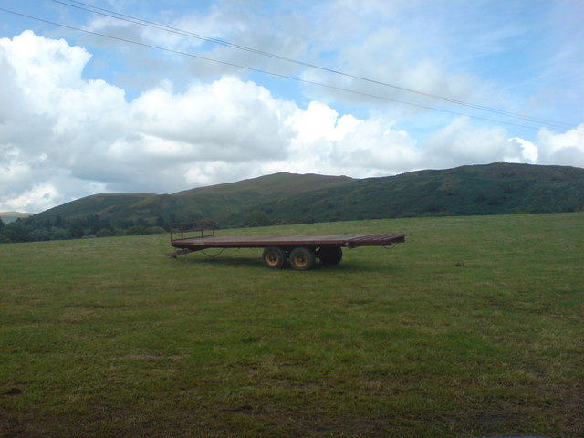 Large trailer on harvested field