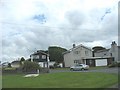 Modern houses on the Green at Four Mile Bridge