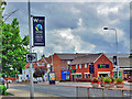 Two banners and a warehouse