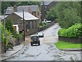 The land-rover decides not to attempt to cross the flood