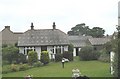 A work of art - a bungalow in Heol Buddug with a decorative slate roof