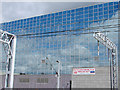 Sky reflected in an office building beside Milton Keynes Station