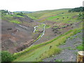 Tarn Beck and remains of spoil heaps at Tindale