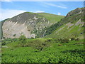 SH6670 : View across the bracken infested valley floor towards the Rhaeadr Fawr waterfall by Eric Jones