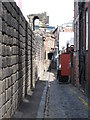 NZ2464 : Cobbled alley behind the West Walls by Mike Quinn