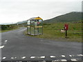 NM5429 : Pennyghael: postbox № PA67 131 and bus shelter by Chris Downer