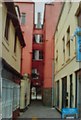 Looking down Salubrious Passage to Wind Street