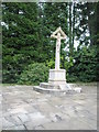 The war memorial in the churchyard at St Alban, Hindhead