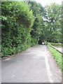 Looking along Headley Road at a point by Boundary Road