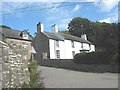 The former rectory viewed across Lon Goch from the lych gate of St Dona