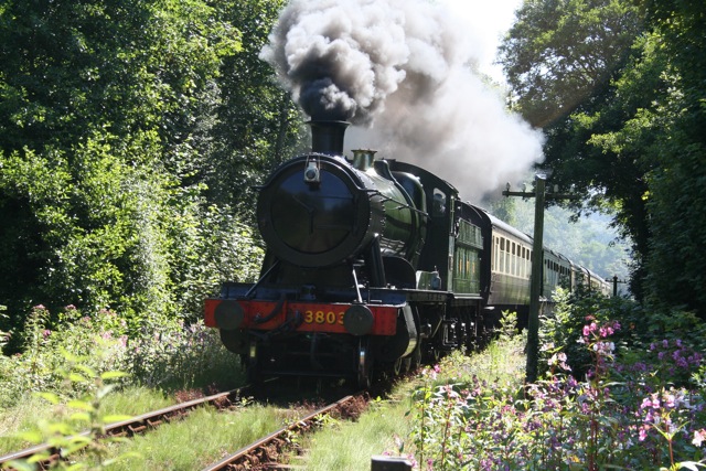 Steam train approaching Staverton station