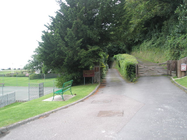 Path passing the tennis courts at the bottom of Countisbury Hill