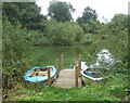 Little boats by little landing stage