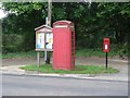 SU0306 : Holtwood: postbox № BH21 20, phone, notice board by Chris Downer