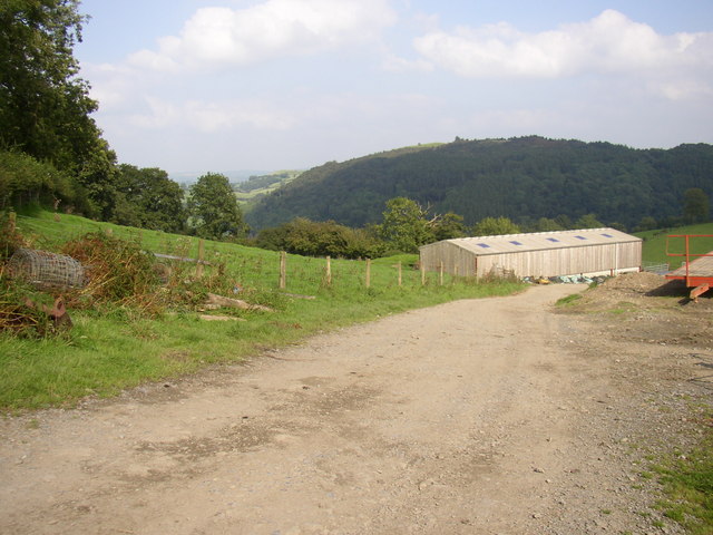 Farm building on edge of hill