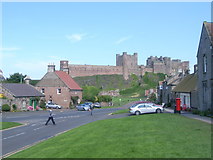NU1834 : Looking through Bamburgh village, towards castle by Nick Mutton 01329 000000