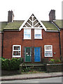 Terraced houses on Briston Road (B1354)