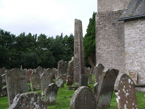Bewcastle: the churchyard at St Cuthbert's, with the 7thC Cross