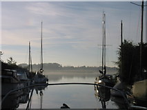 TG4122 : Leaving Hickling Staithe in the early morning mist by Renata Edge