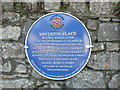 History plaque on wall at Boverton Place.