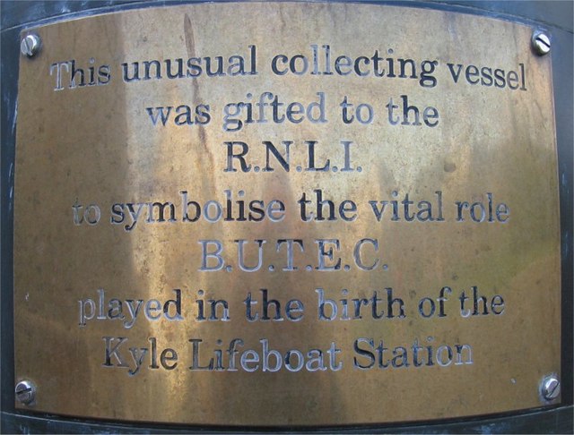 Money collecting vessel outside RNLI Kyle of Lochalsh Station - Detail of Plaque