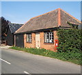 Roadside building incorporating Boxted postbox