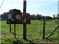 ST9202 : Tarrant Crawford: postbox № DT11 111 and noticeboard by Chris Downer